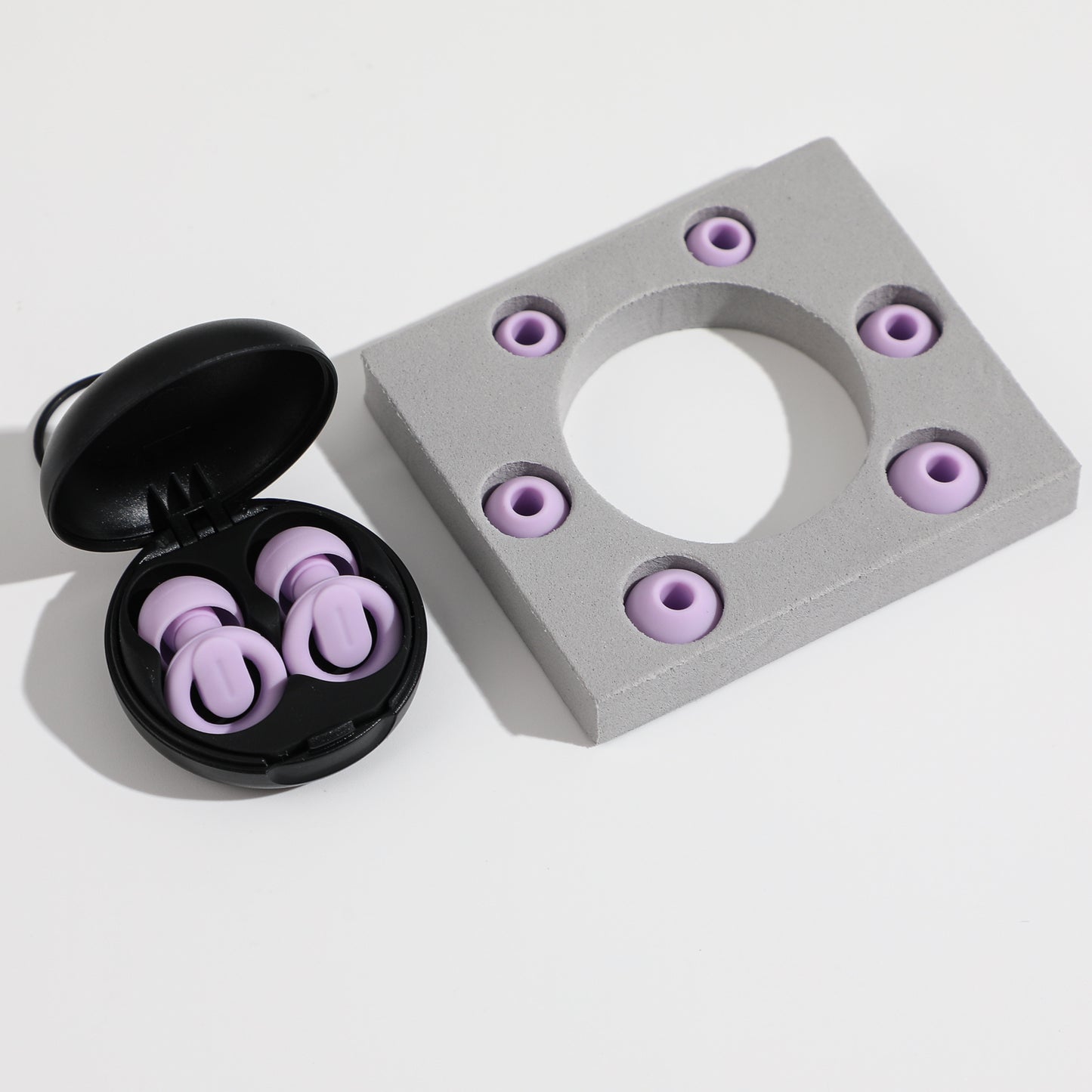 Ohrenstöpsel in Behälter und Packetinhalte